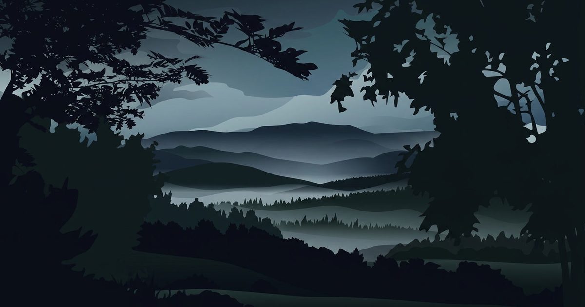 Layered misty hills at dusk in the eastern Cairngorms, framed by dark trees.